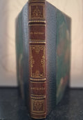 Anthinéa book with Ch. Maurras lettering, a decorated brown spine and blue-green boards